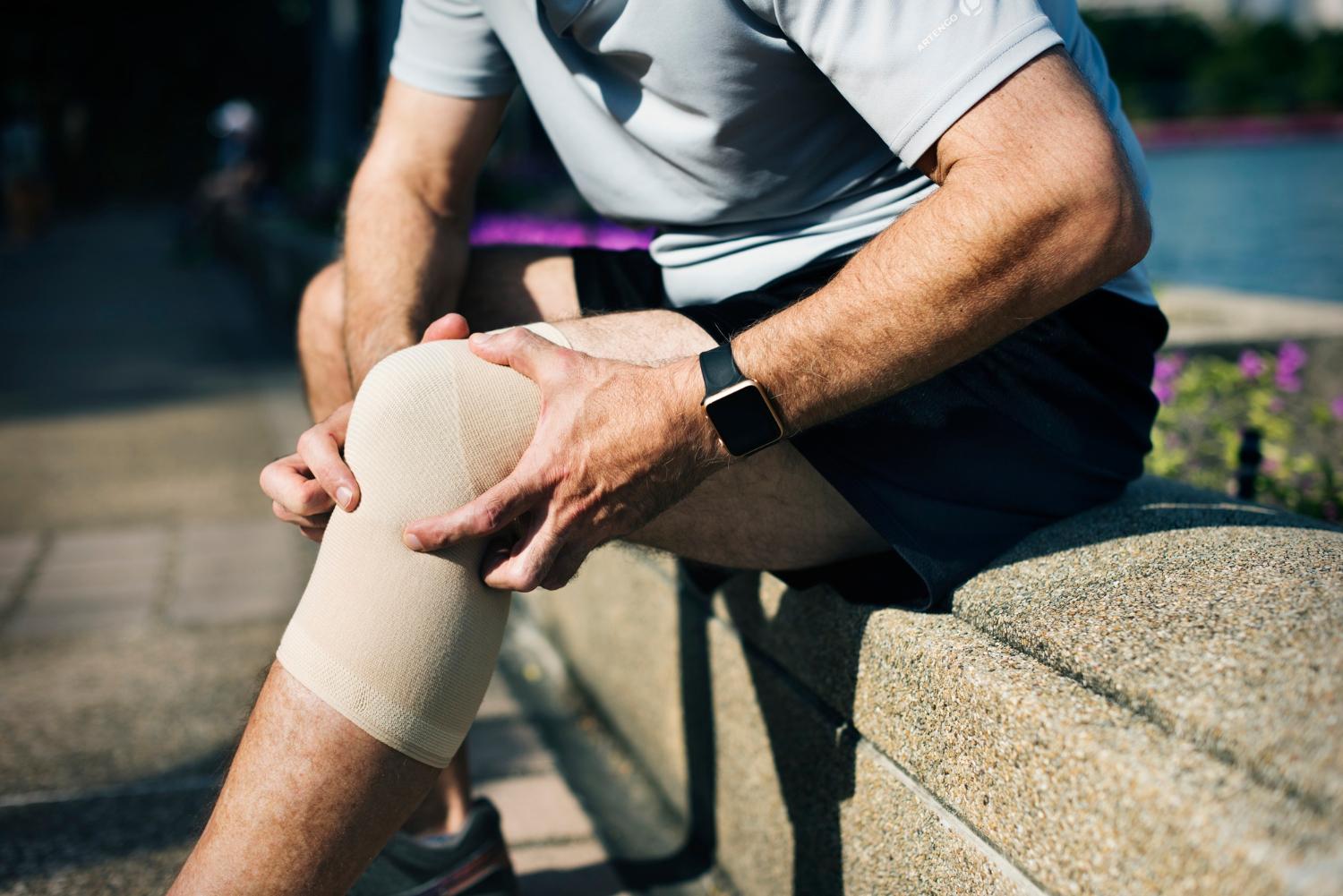 Man with knee osteoarthritis symptoms considering osteoarthritis treatment options