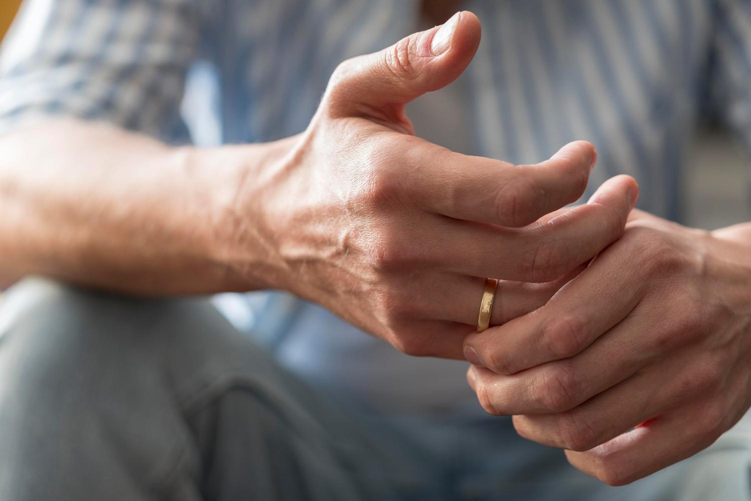 Close-up of a painful joint in the hand related to rheumatoid arthritis treatment options.